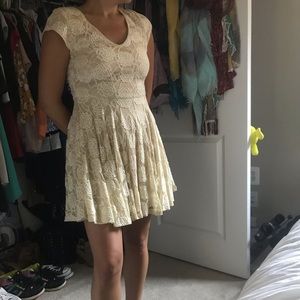 Tan dress with white embroidered flowers